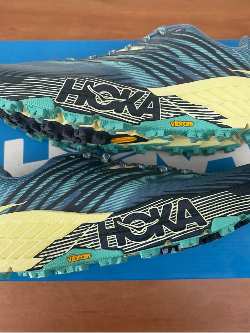 Hoka One One Women's Blue and Pale Yellow Trail Runners